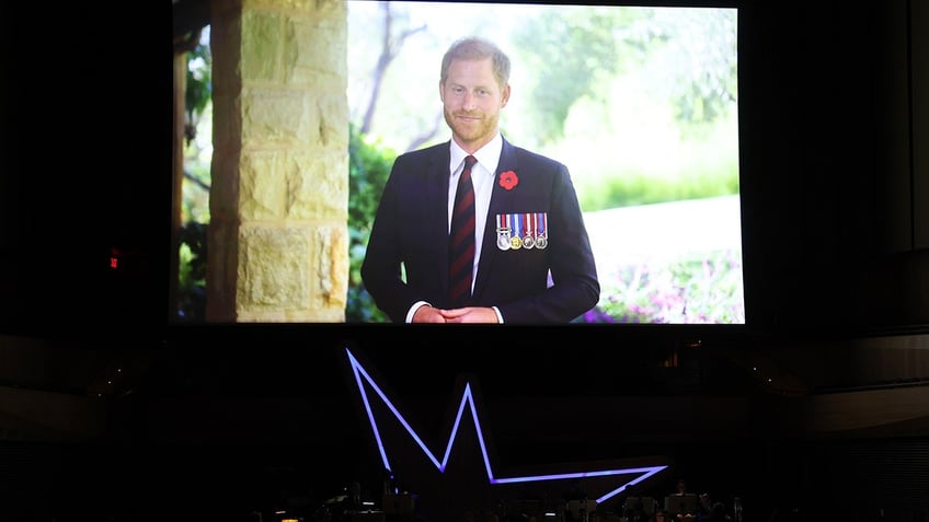 prince harry pokes fun at himself while prince william hangs with hollywood elite