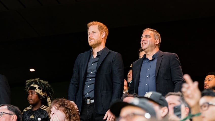 prince harry spotted without meghan markle as he cozies up to a list stars at messi soccer game