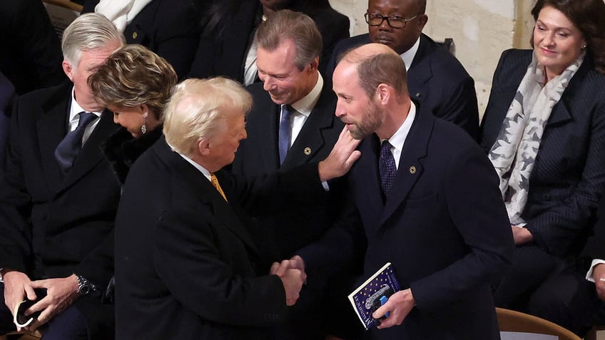 Donald Trump warmly greeting Prince William