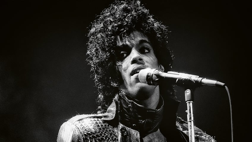 A close-up of Prince performing.