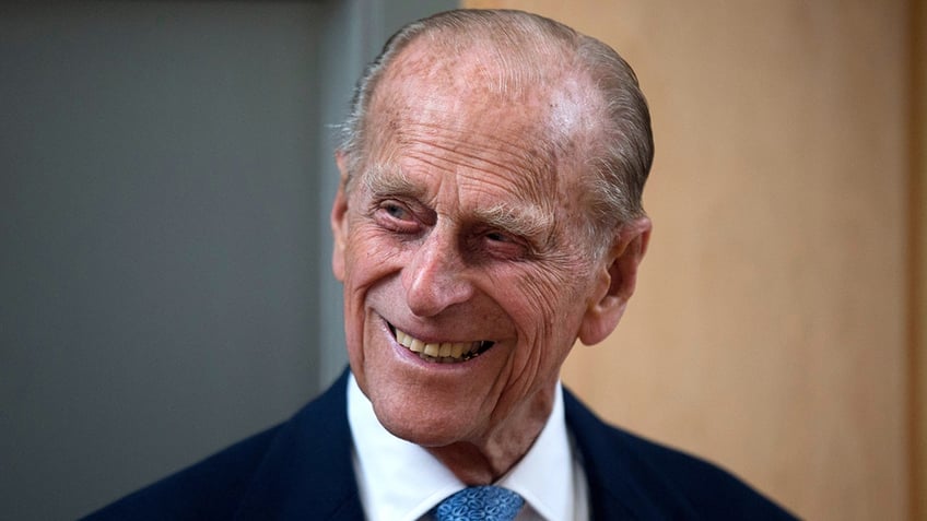 prince philip kept 70s erotic manual on bookshelf queen elizabeth once dropped f bomb insiders claim