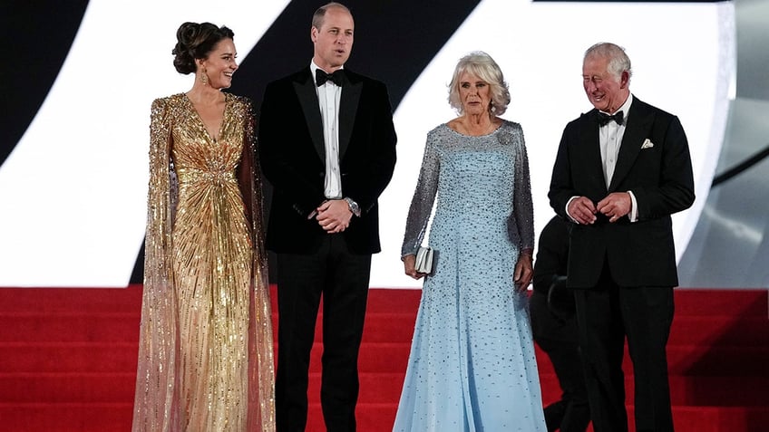 Camilla, Duchess of Cornwall wearing a pale blue gown next to the rest of the royal family.