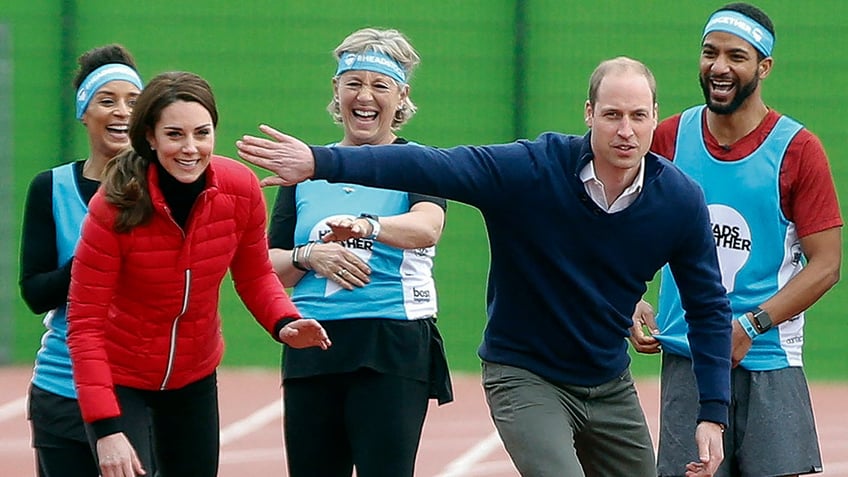 Prince William and Kate Middleton preparing to race.