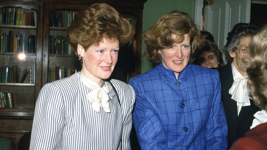 A close-up of Princess Dianas sisters in their younger years standing side by side.