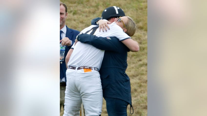 Zara Tindall hugging Prince Willaim