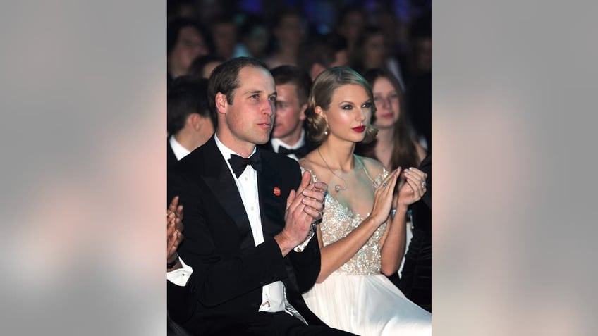 prince william sitting next to taylor swift