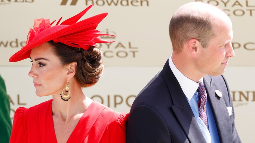 Kate Middleton and Prince William looking away from each other.