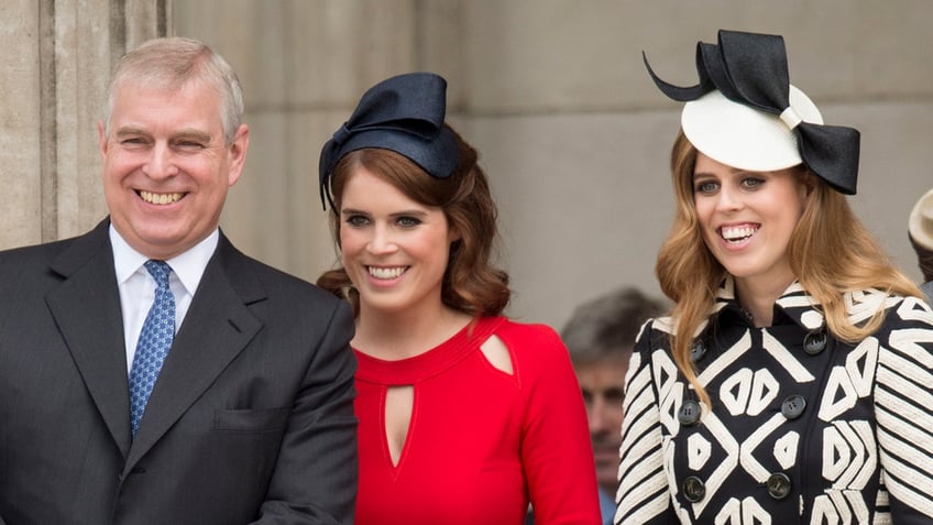 Prince Andrew attends an event with his two daughters