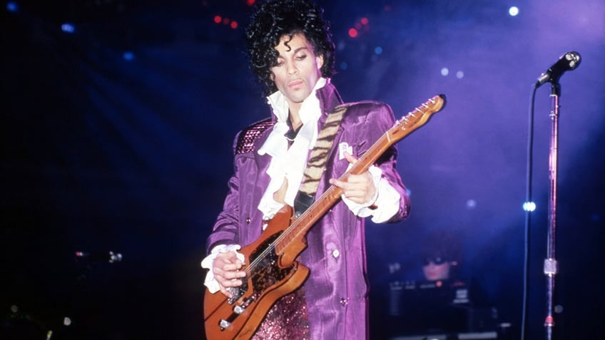 Prince performing on stage