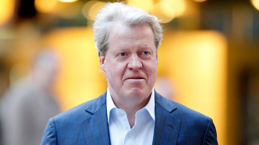 A close-up of Earl Charles Spencer in a blue blazer and white shirt.