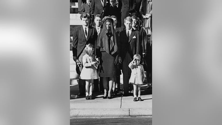 John F. Kennedy Jr. as a child giving a salute to his late father.