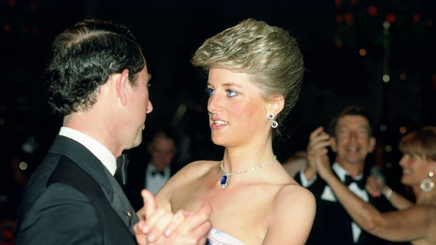 Princess Diana dancing with Prince Charles