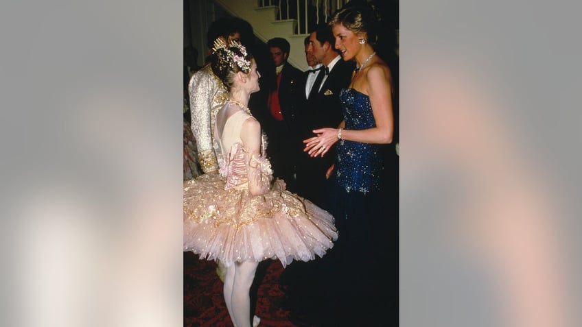 Princess Diana chatting with a ballerina.