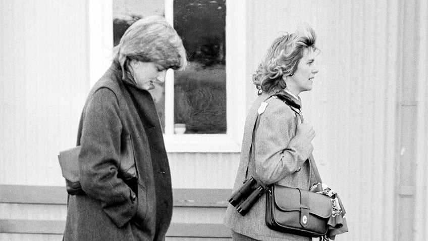 Princess Diana walking behind Camilla Parker Bowles