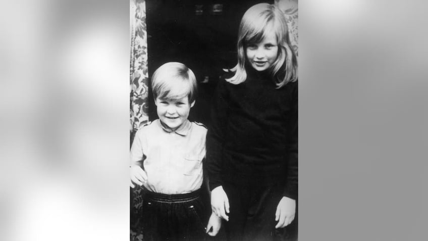 A black and white childhood photo of Charles Spencer and Princess Diana