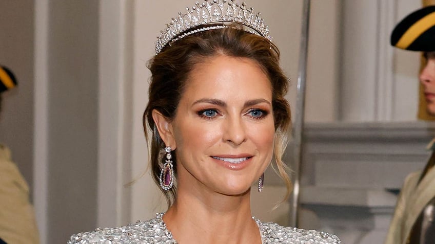 princess madeleine of sweden wearing a crown and smiling