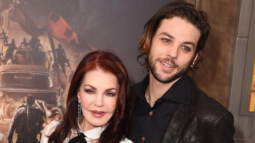 Priscilla Presley and Navarone Garcia pose on red carpet