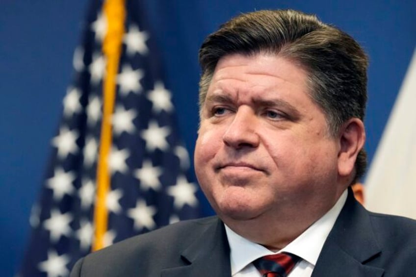 pritzker takes abortion fight national with dark money group