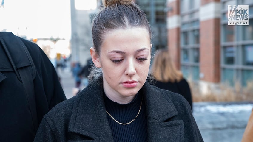 Kelsy Brainard departs the courthouse after being arraigned in Worcester District Court