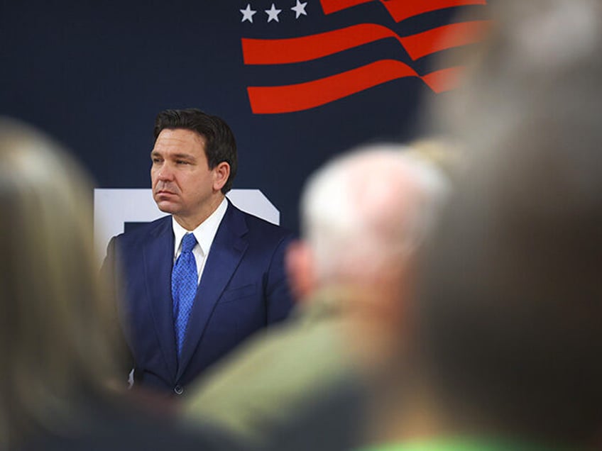 Republican presidential candidate Florida Governor Ron DeSantis speaks to guests during the Scott County Fireside Chat at the Tanglewood Hills Pavilion on December 18, 2023 in Bettendorf, Iowa. Iowa Republicans will be the first to select their party's nomination for the 2024 presidential race when they go to caucus on …