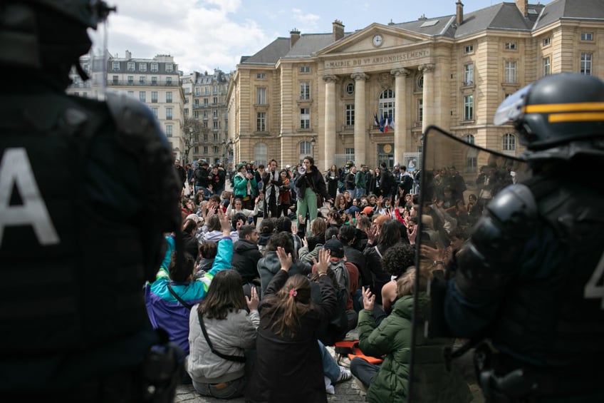 Demonstrators locked inside the perimeter at the Sorbonne university students rally against President Emmanuel Macron s stance on the situation in Gaza as part of his speech at the institution in Paris, France on April 25, 2024. Several dozens of students and participants of pro Palestinian organizations gathered at the Pantheon square. (Photo by Victoria Valdivia / Hans Lucas / Hans Lucas via AFP) (Photo by VICTORIA VALDIVIA/Hans Lucas/AFP via Getty Images)