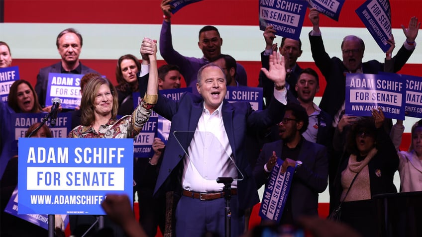 Adam Schiff celebrating on stage