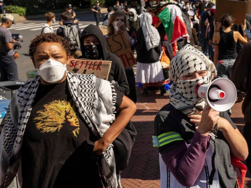 Pro-Palestinian supporters protest outside Columbia University, Tuesday, Sep. 3, 2024, in