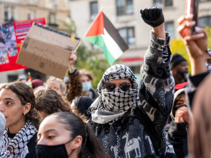 Students participate in a protest in support of Palestine and for free speech outside of t