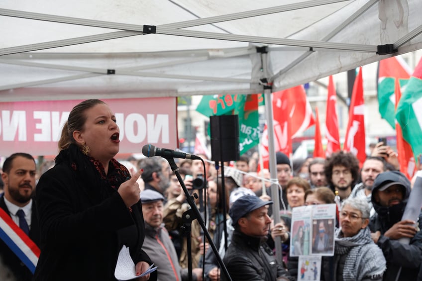 President of French leftist La France Insoumise (LFI) group at the National assembly and MP Mathilde Panot, addresses the crowd during a rally "against the criminalisation of voices of peace" organised by the LFI, following a police summons for Panot and another party member, in Paris on April 30, 2024. Panot and French-Palestinian lawyer and founder of the Refugees Camps Observatory (Observatoire des Camps de Refugies - OCR) and on France's leftist-wing "La France Insoumise" (LFI) party' list for the upcoming European Parliament elections Rima Hassan, are being questioned by the police on April 30, 2024, as part of investigations into "apology for terrorism" after comments linked to the war in the Middle East, summonses described as "censorship" by La France insoumise. (Photo by Geoffroy VAN DER HASSELT / AFP) (Photo by GEOFFROY VAN DER HASSELT/AFP via Getty Images)