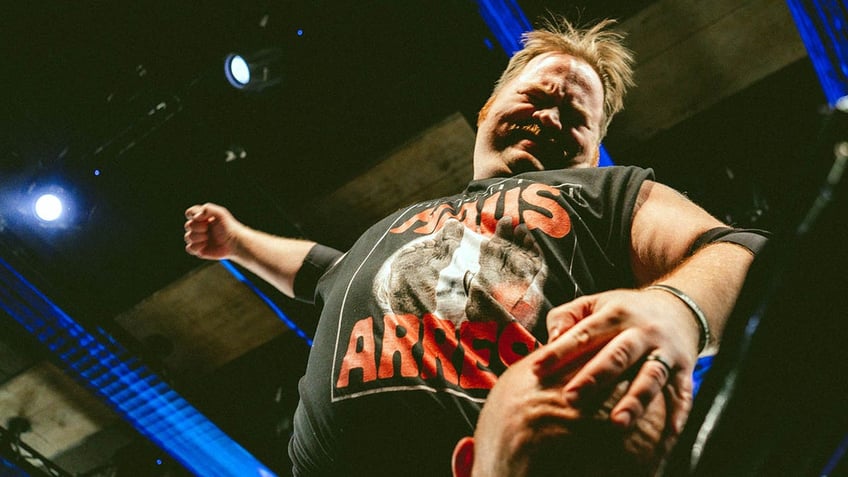 Paul Walter Hauser punches