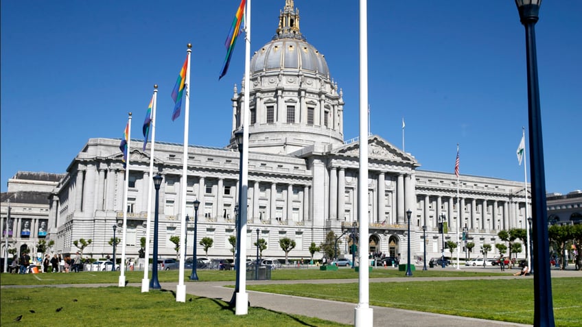 San Francisco City Hall with gay pride flags on flagpoles