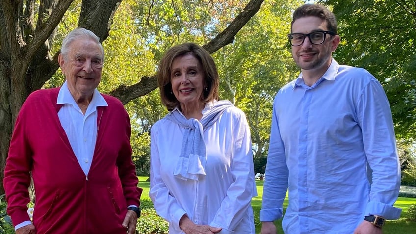 George and Alex Soros, left and right, with Nancy Pelosi center
