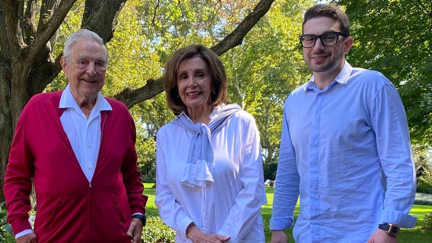George and Alex Soros, left and right, with Nancy Pelosi center