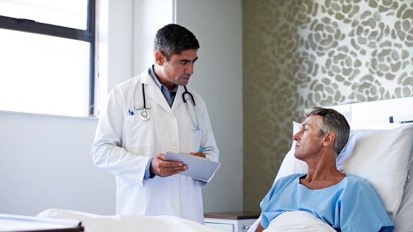 Man in hospital bed