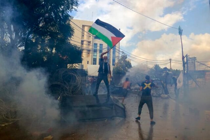 protesters in lebanon decrying gaza hospital blast clash with security forces near us embassy