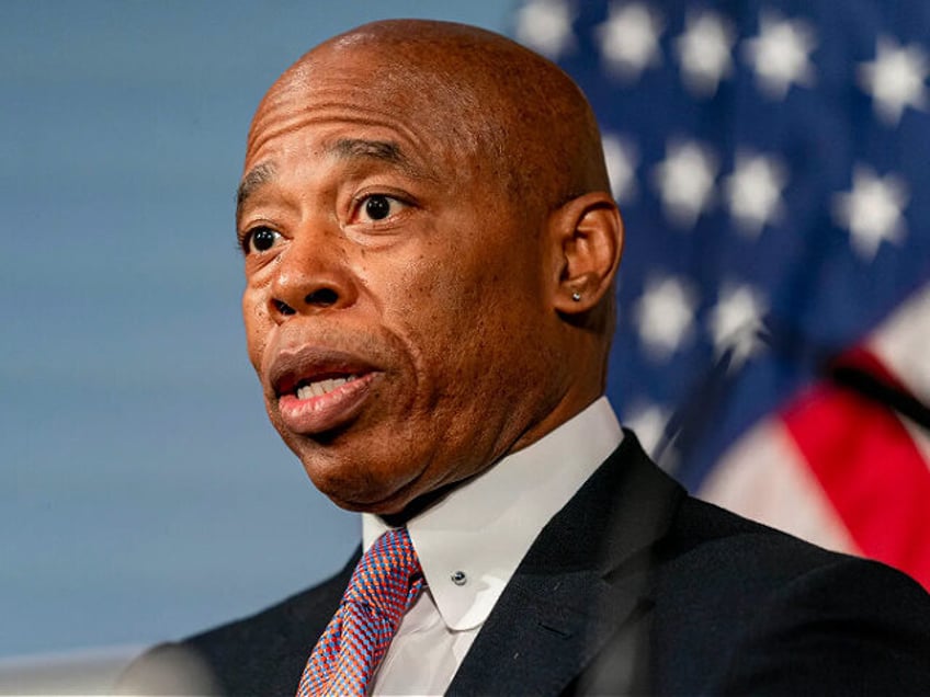 FILE - New York City Mayor Eric Adams speaks during a news conference at City Hall, Dec. 1