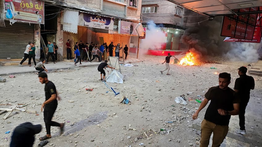 protesters take to the streets of gaza demanding better living conditions from hamas rulers