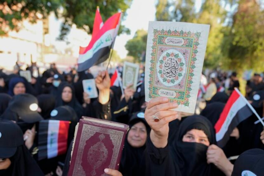 protesters try to storm baghdads green zone over the burning of quran and iraqi flag in denmark