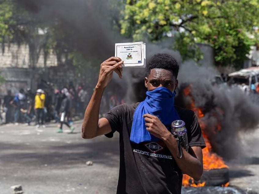 PORT-AU-PRINCE, HAITI - APRIL 02: Huge crowd of demonstrators take to the streets as they