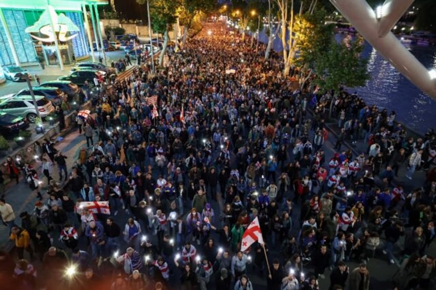 Thousands take part in the latest demonstration in the Georgian capital against the govern