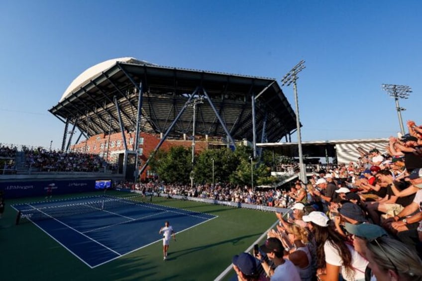 A packed house watches Daniel Evans beat Karen Khachanov in the longest match in US Open h