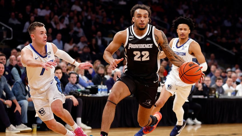 Devin Carter dribbles the ball