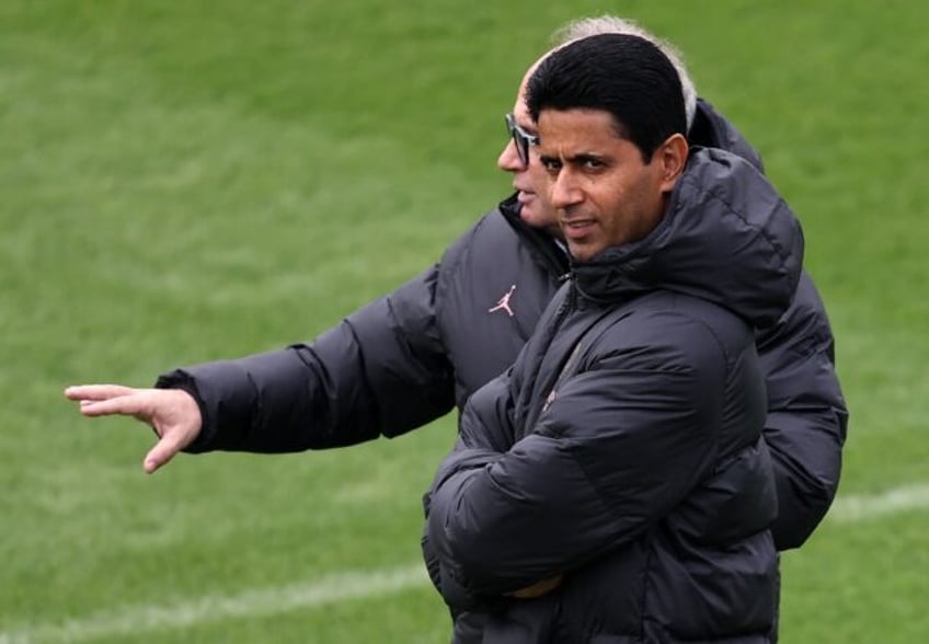 Paris Saint-Germain's Qatari president Nasser al-Khelaifi (R) wants "to build a new stadiu