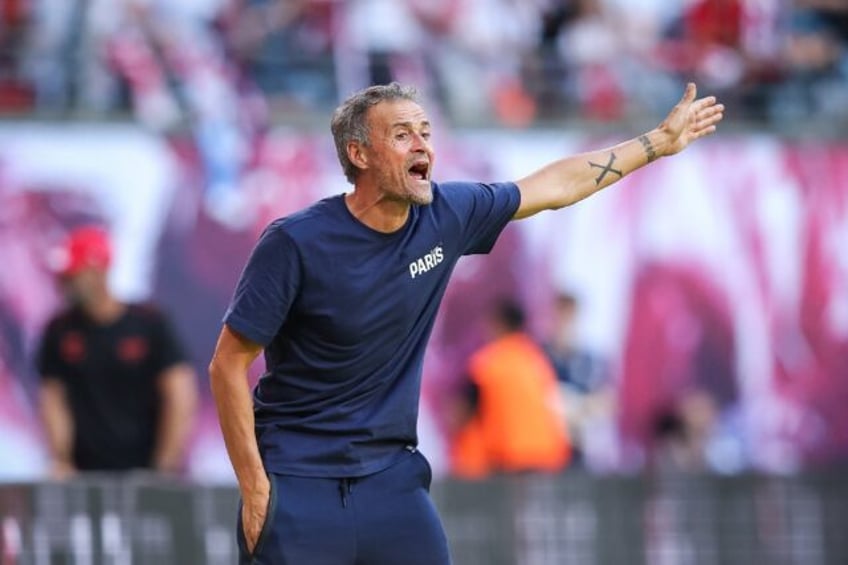 Paris Saint-Germain coach Luis Enrique shouts instructions during his side's friendly draw