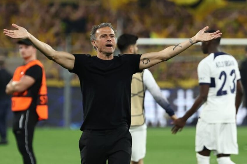 PSG coach Luis Enrique reacts at the end of his side's 1-0 defeat by Borussia Dortmund in