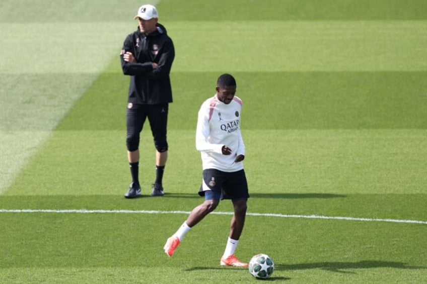 Ousmane Dembele (white shirt) has been given the green light to play against Arsenal on We