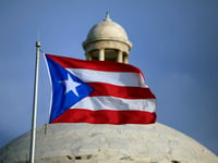 Puerto Rico’s 2 biggest parties hold primaries as governor seeks 2nd term and voters demand change