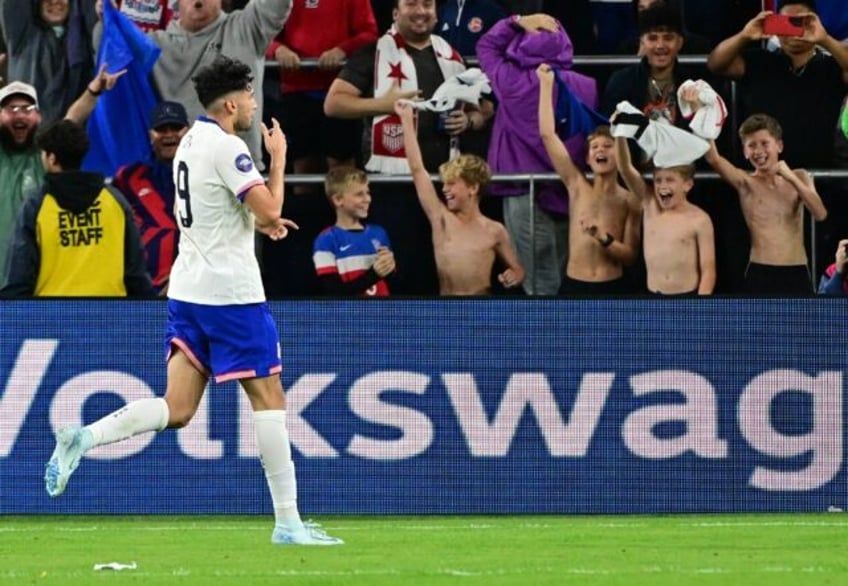 US forward Ricardo Pepi celebrates after scoring his team's third goal in a 4-2 CONCACAF N