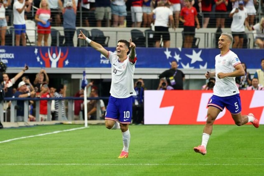 USA captain Christian Pulisic celebrates his goal in Sunday's Copa America victory over Bo