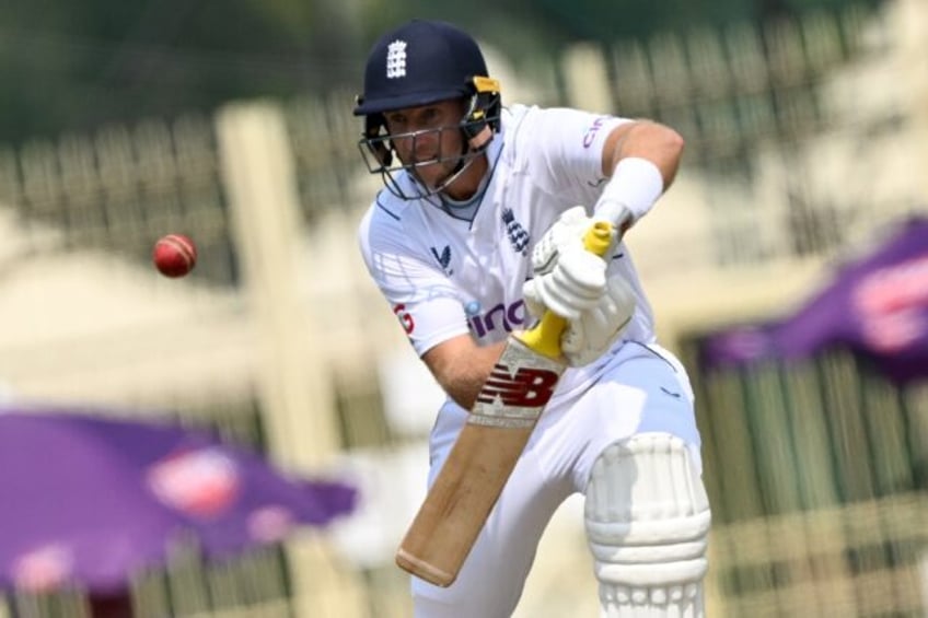 England's Joe Root plays a shot on his way to scoring 106 not out on the first day of the